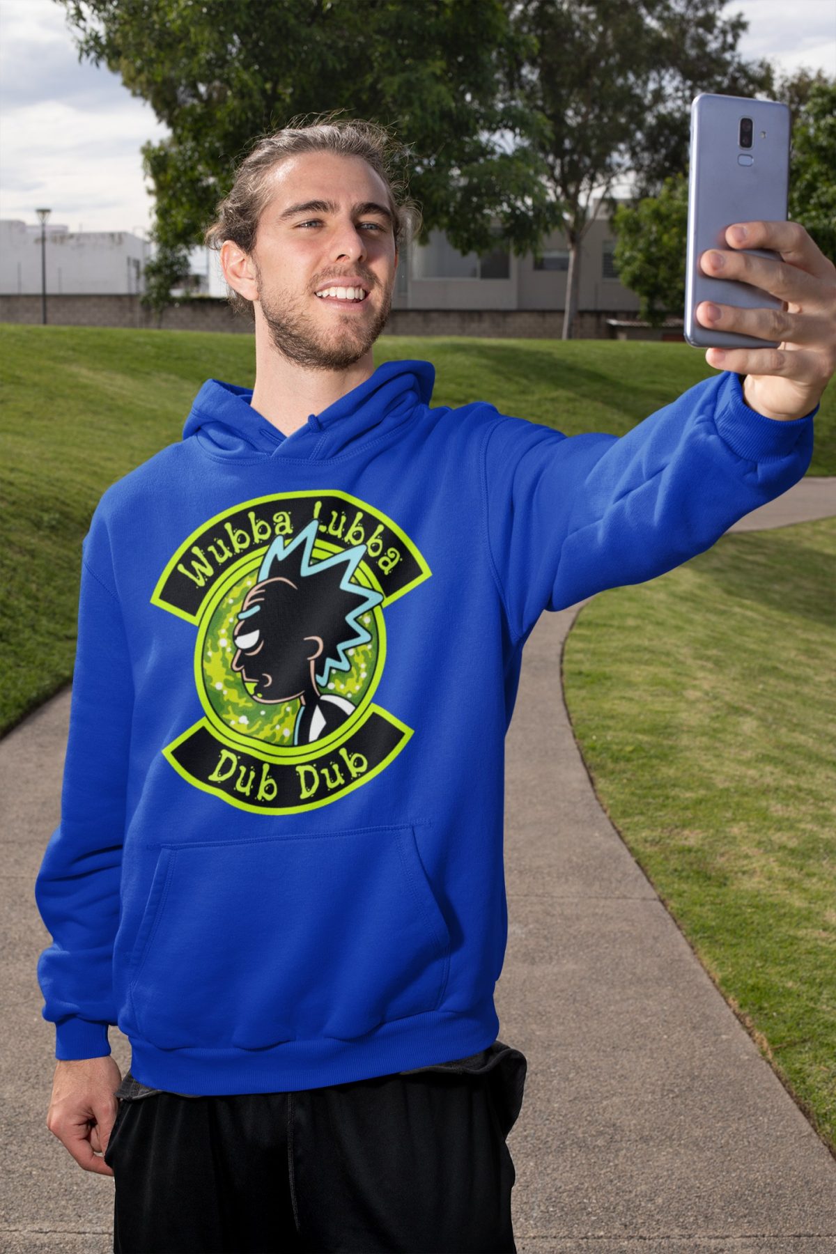 mockup of a man with a hoodie taking a selfie on the street 32312 2 compressed 1 - Rick And Morty Merch